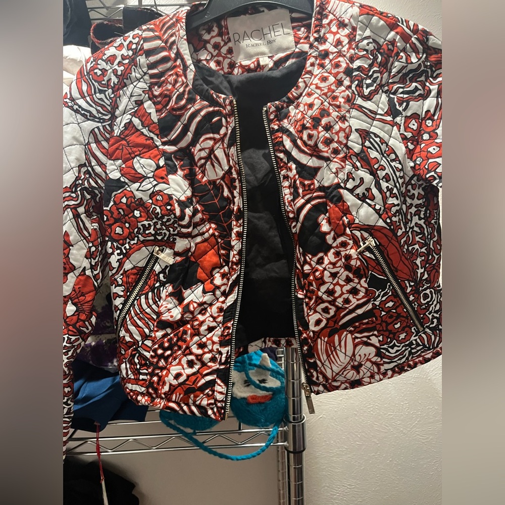 Red floral pattern on white backgroundound nice jacketet